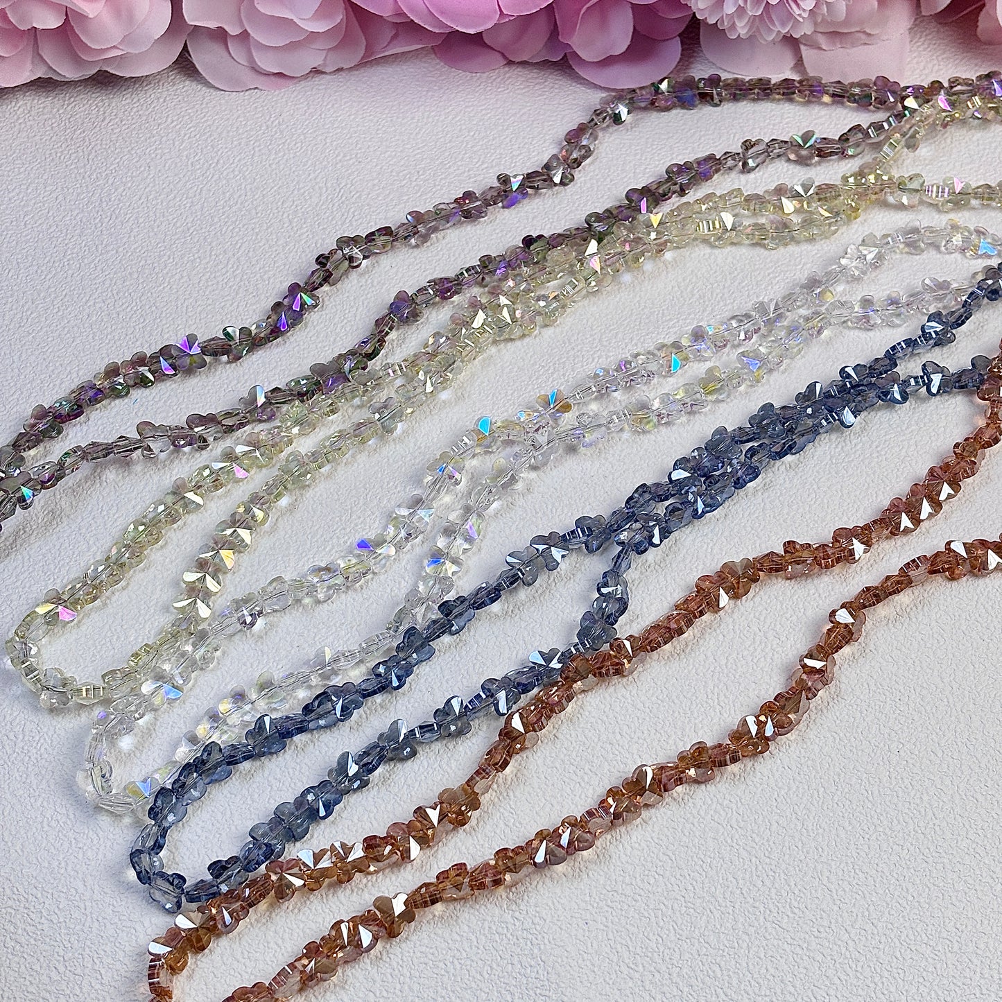 Butterfly-shaped, glittering brightly